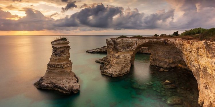 A famous rock arch in southern Italy’s Puglia region collapsed after severe weather, raising concerns over coastal erosion.