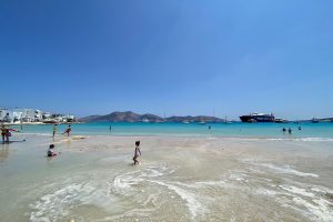 Cheapest Greek Islands to Visit: Where Prices Stay Sane 19 A shallow turquoise beach on Koufonisi in the Cyclades with swimmers